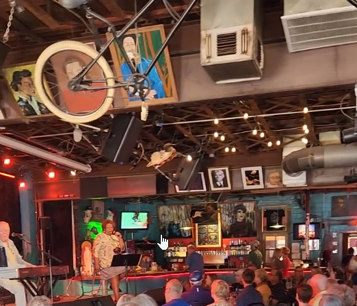 Inside Dan's Silverleaf with art on the walls in Denton, TX