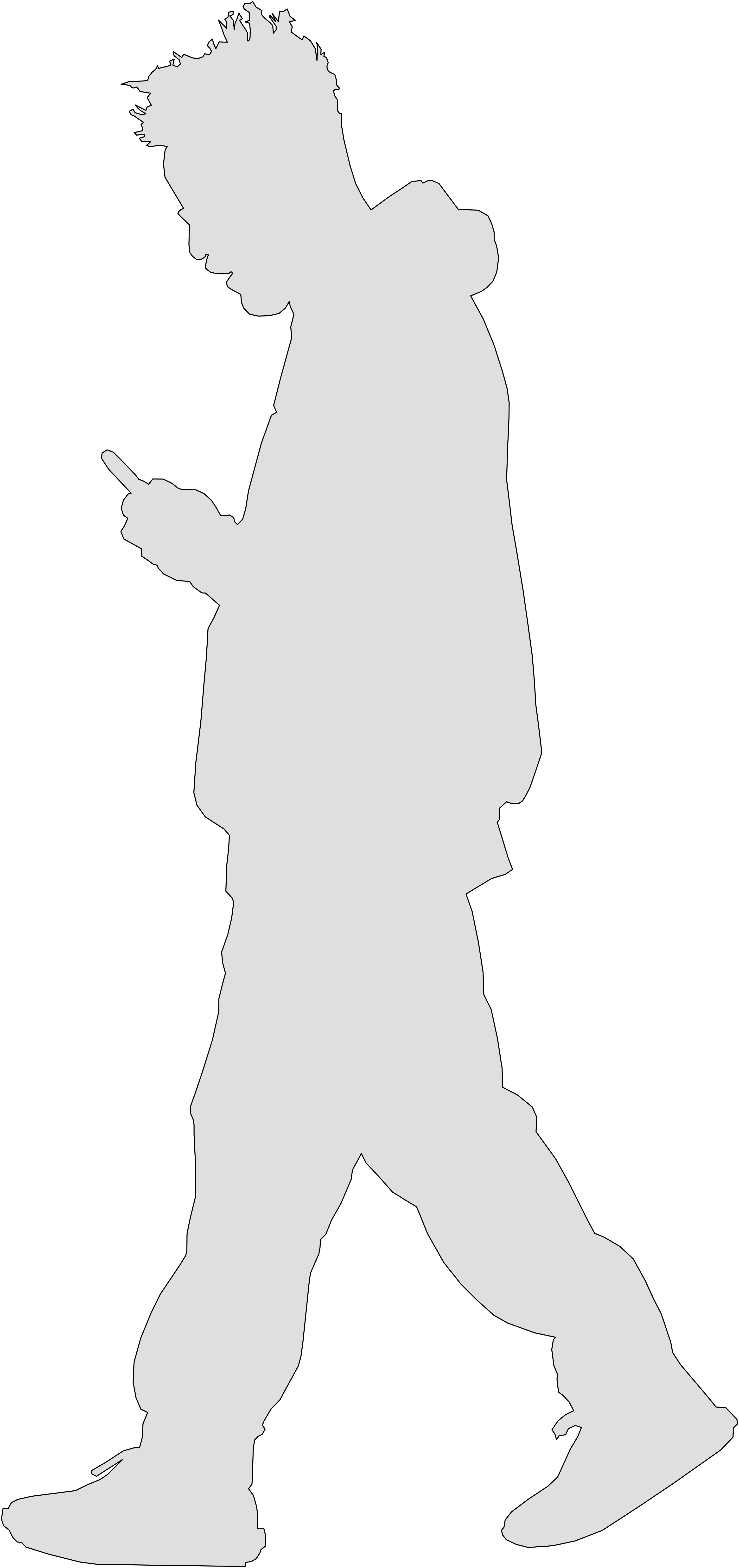 Man walking while looking at phone