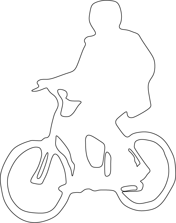 man riding a bike down the street