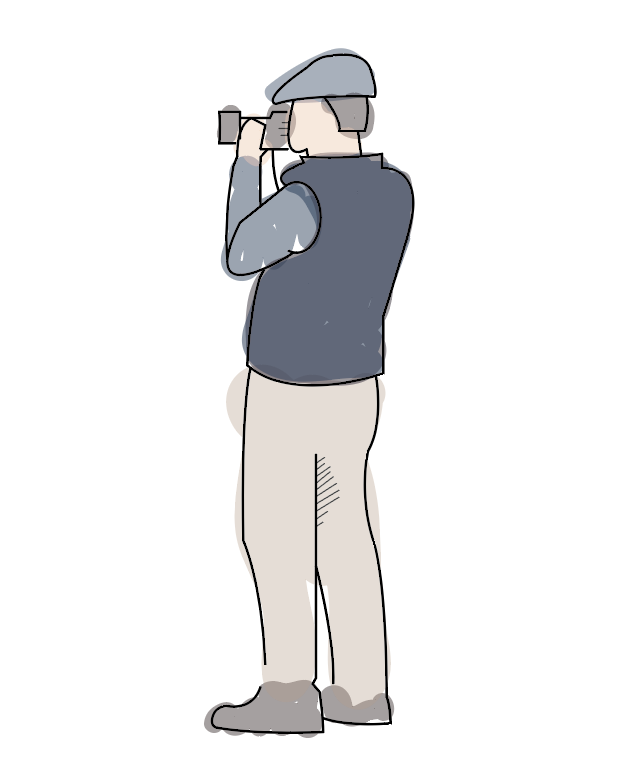 an older man taking a photo