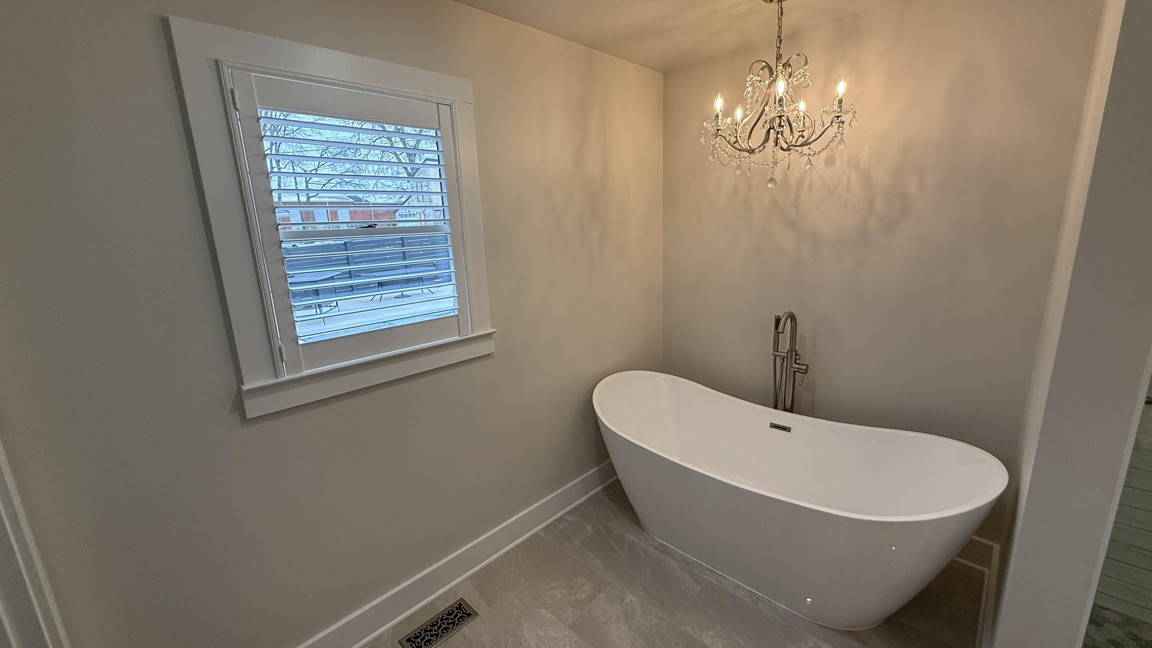 Interior window shutters in a living room installed by Simmonds Blinds and Drapes in Owensboro, KY. Call (270) 477-3071 for a free consultation.