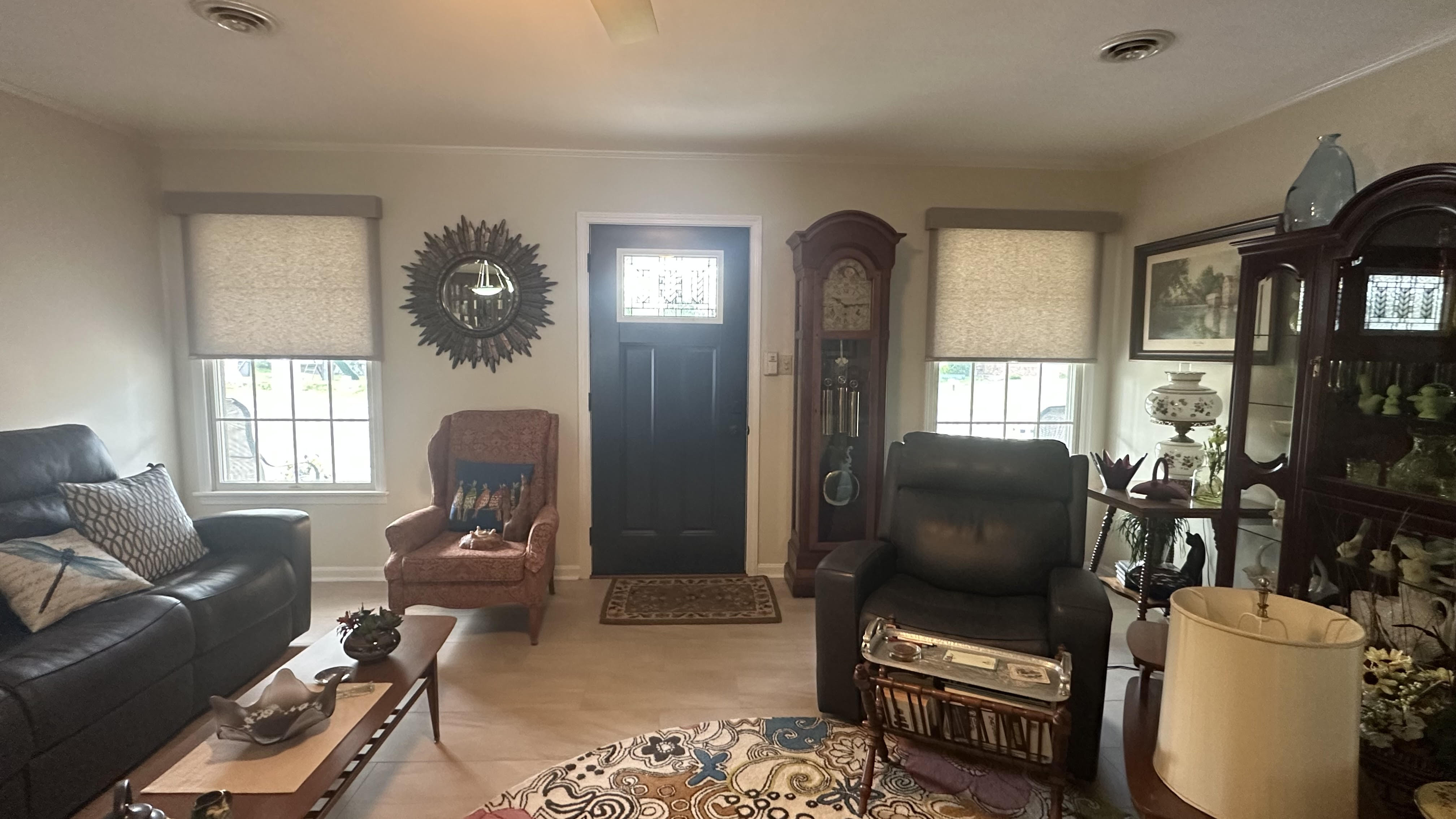 Roller shades in a living room installed by Simmonds Blinds and Drapes in Bowling Green, KY. Call (270) 514-4492.