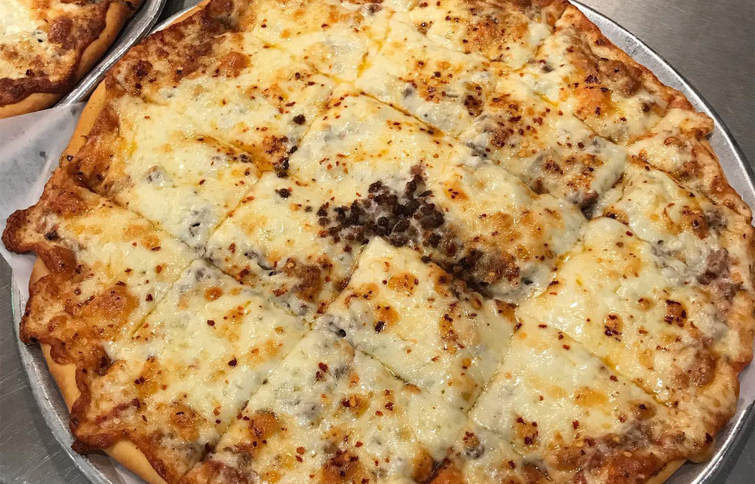 Pizza made from scratch daily is always served at G&D Pizzeria in Columbia, MO.