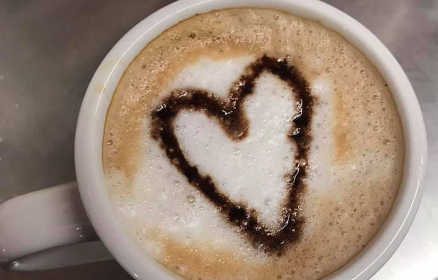 Enjoy a cup of coffee with breakfast at Ernie's Cafe in Columbia, MO.