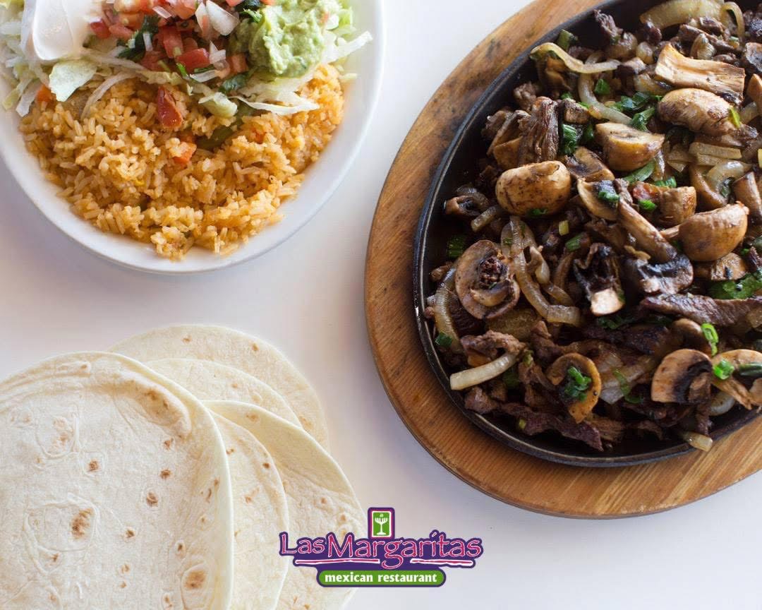 Order fresh & delicious pizza at Deuce Pub & Pit in Columbia, MO.