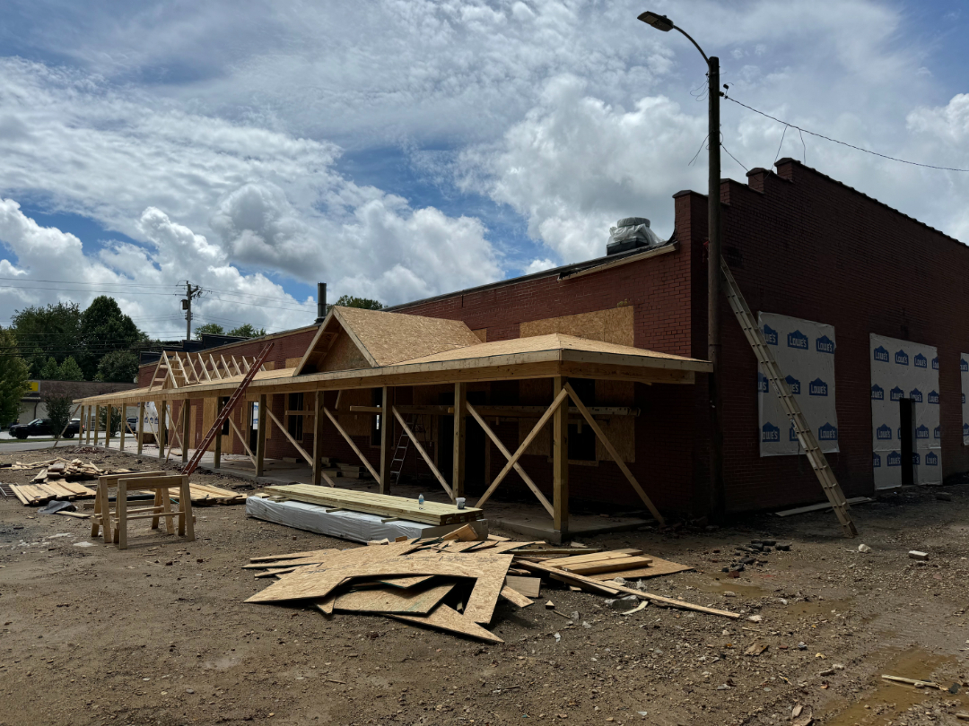 Commercial building exterior under construction and restoration work by Foothills Construction and Restoration Services in Marion, North Carolina, phone (828) 600-5227.