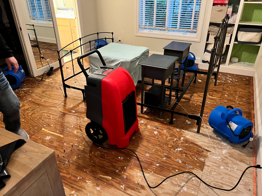 Residential water damage cleanup with professional drying equipment inside a home by Foothills Construction and Restoration Services in Hickory, NC. Phone (828) 536-4435.