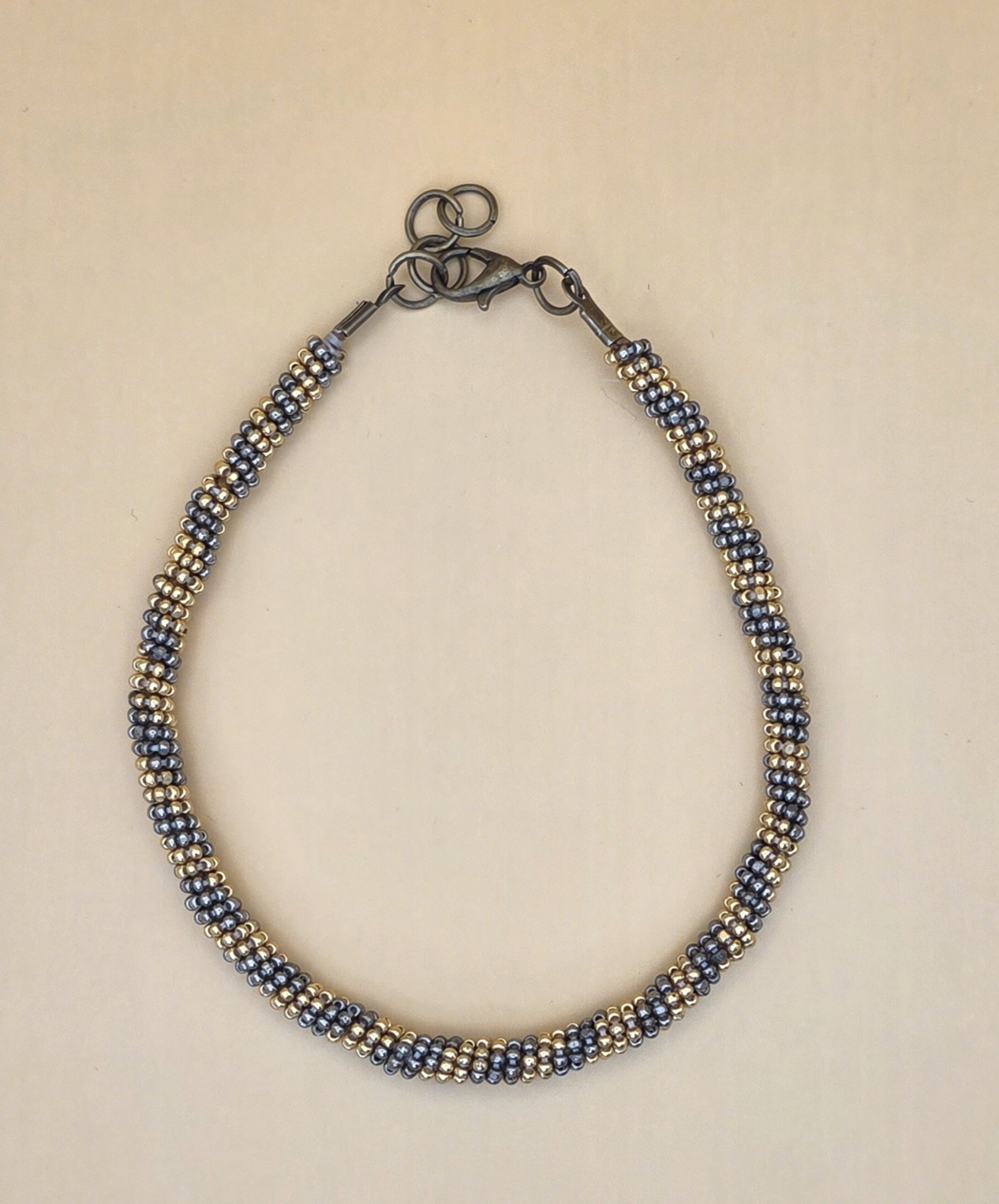 Steel Sky Beaded Rope Bracelet — Gunmetal and Gold