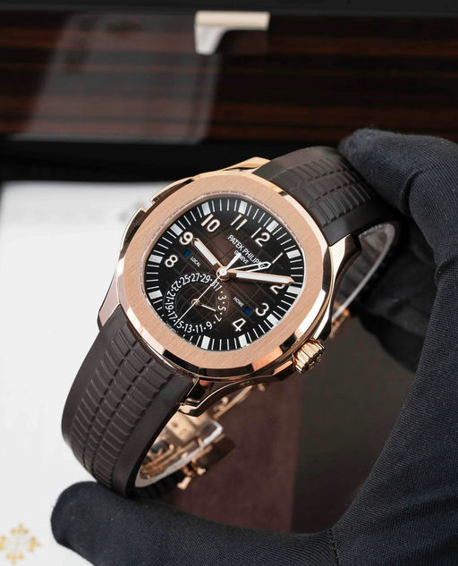 Patek Philippe Aquanaut Travel Time Ref. 5164r — Pre-Owned, authenticated by 13th Time