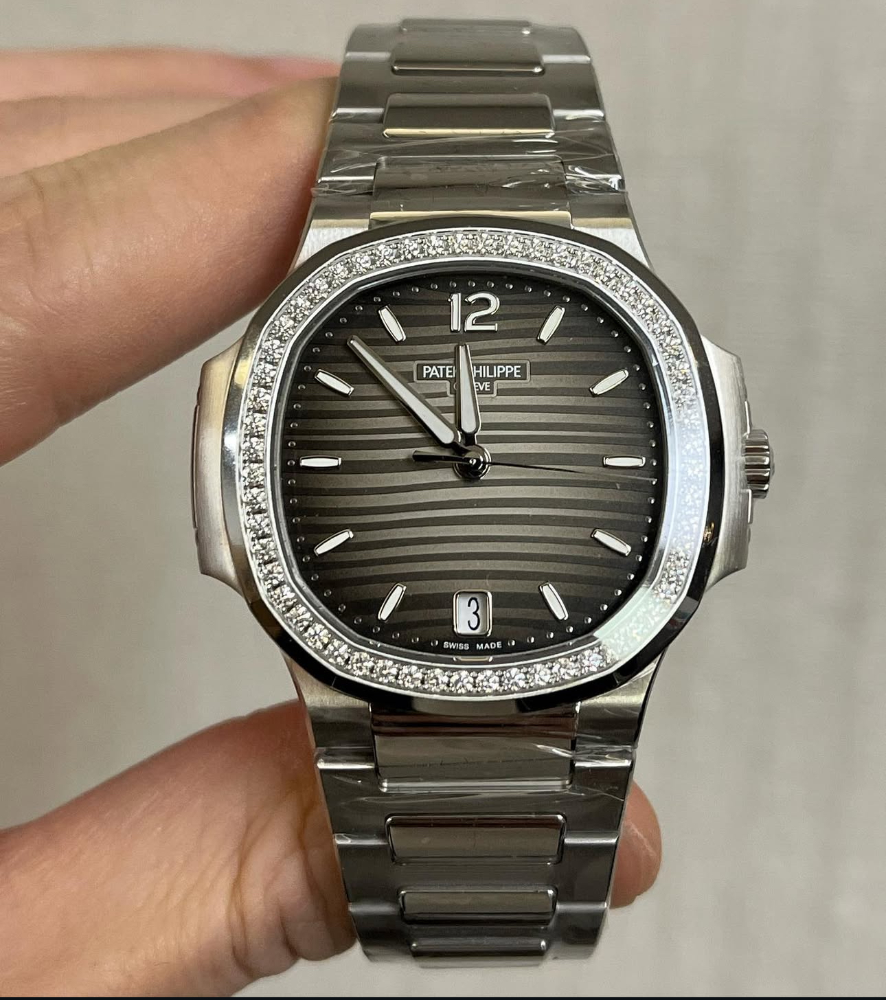 Patek Philippe Nautilus Ref. 7118/1200a grey — Brand New condition, authenticated by 13th Time