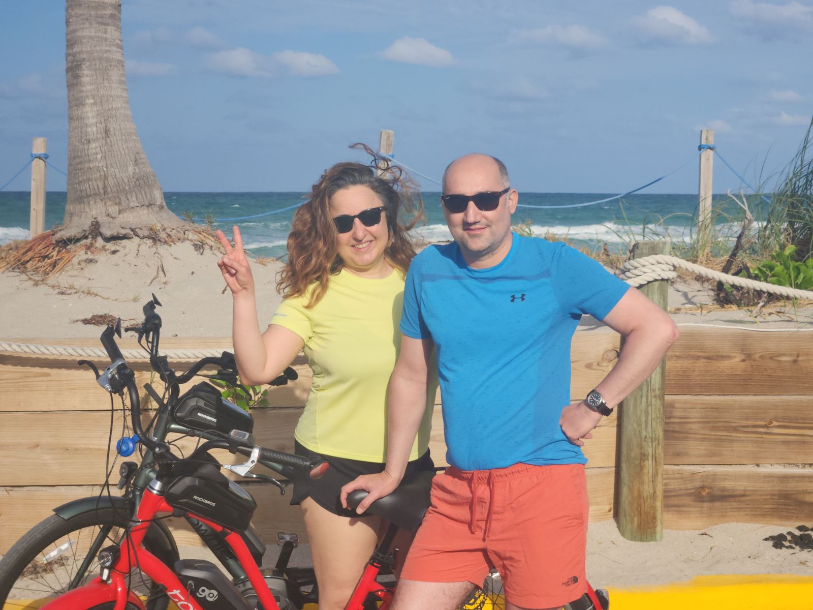 a couple with ebikes in dania beach