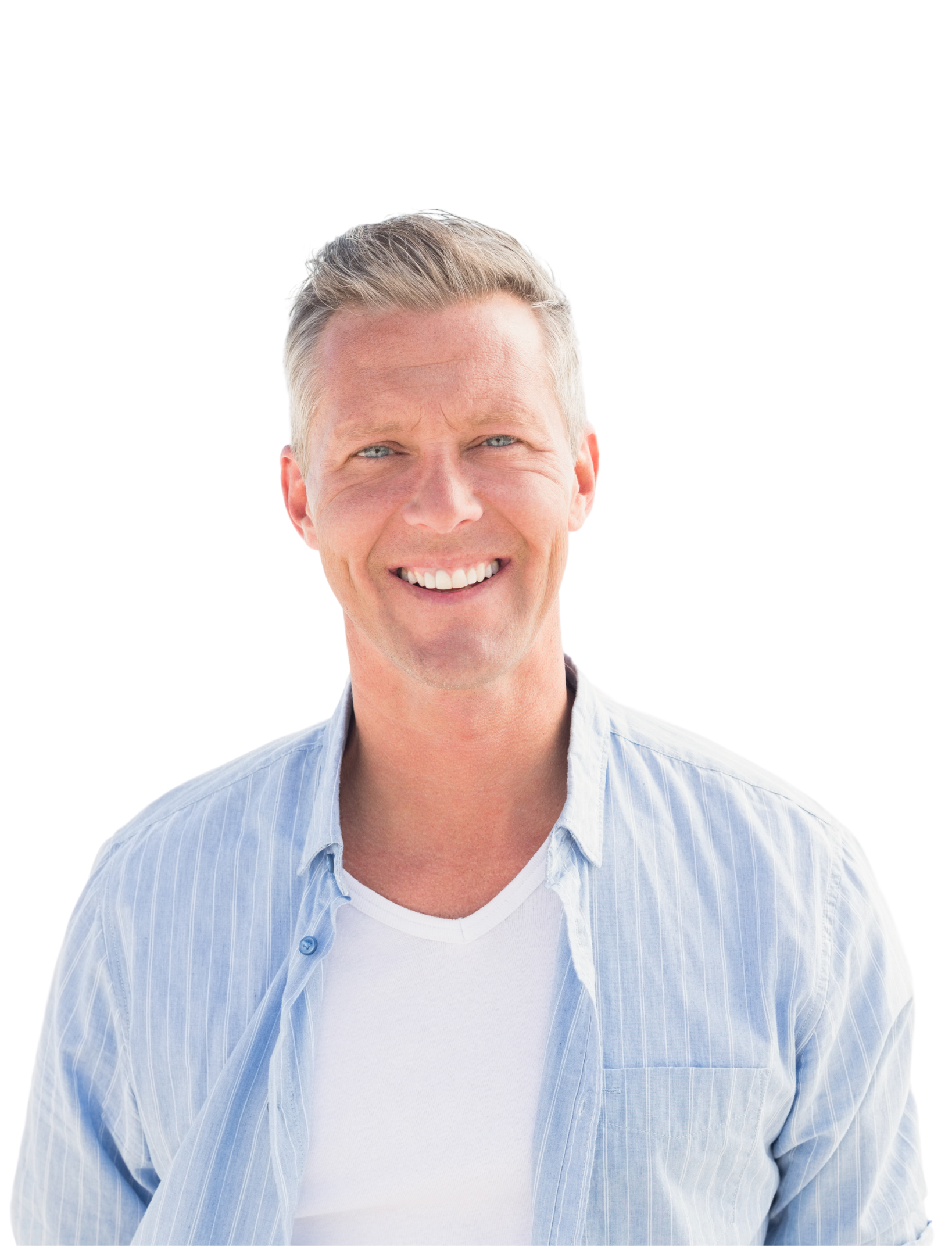 A woman in a white shirt is smiling with her hand on her chin