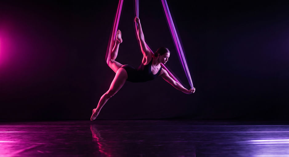 Aerial Dancer with Magenta Lighting