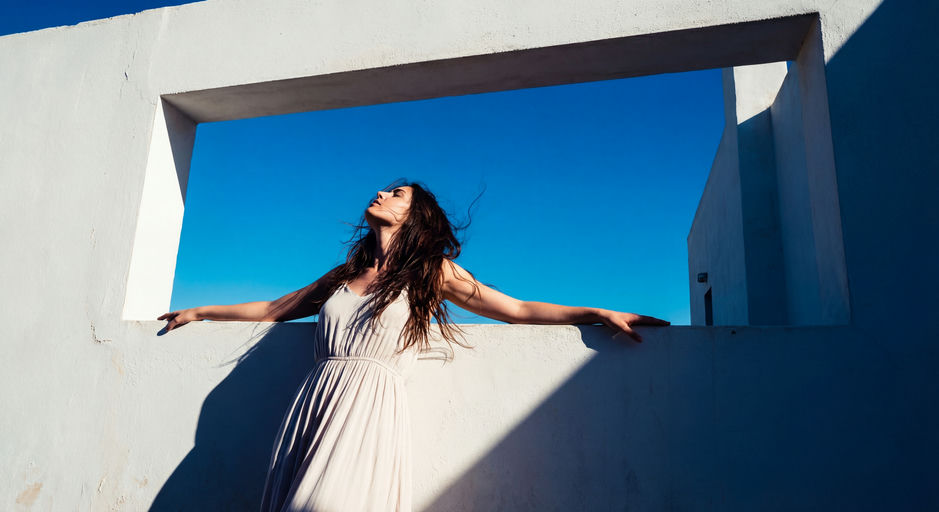 Model Against White Plaster Wall