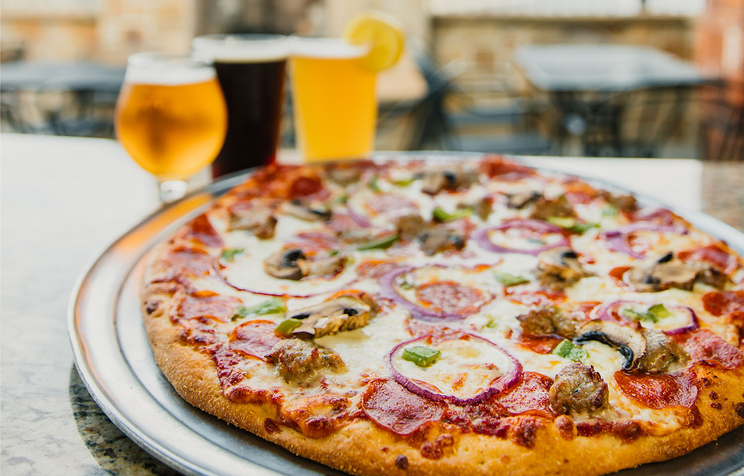 Eat Pizza, Burgers, and Enjoy Ice-Cold Beer at 1839 Taphouse in Columbia, MO.