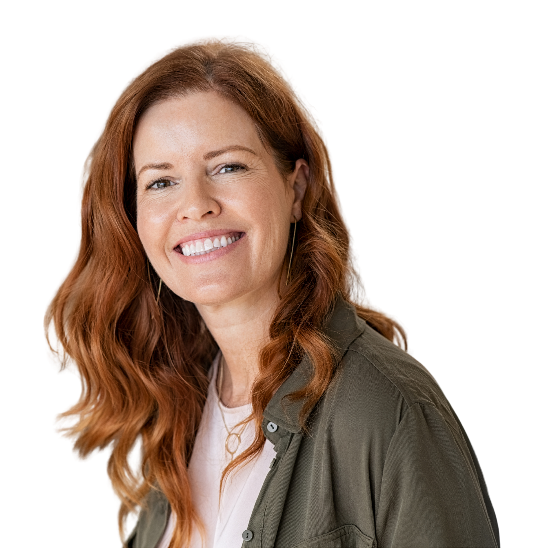 A woman with long hair is smiling with her hands on her face.