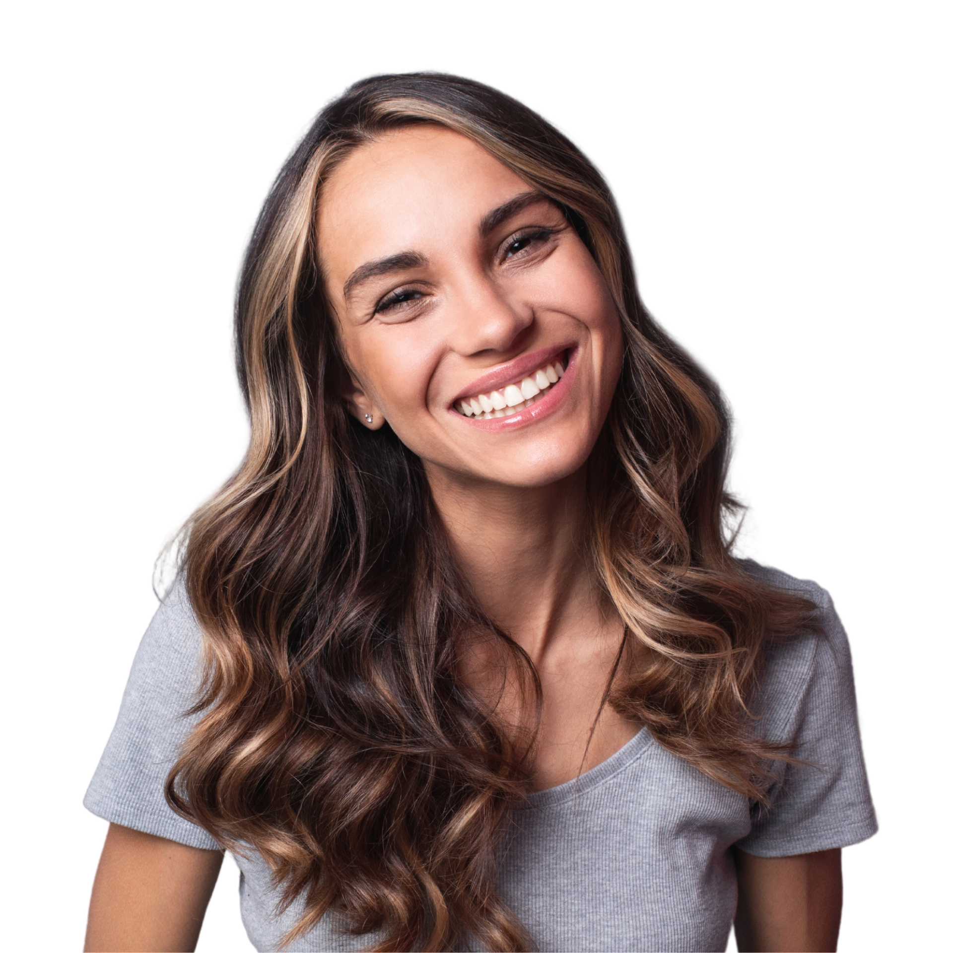 A woman with long hair is smiling with her hands on her face.