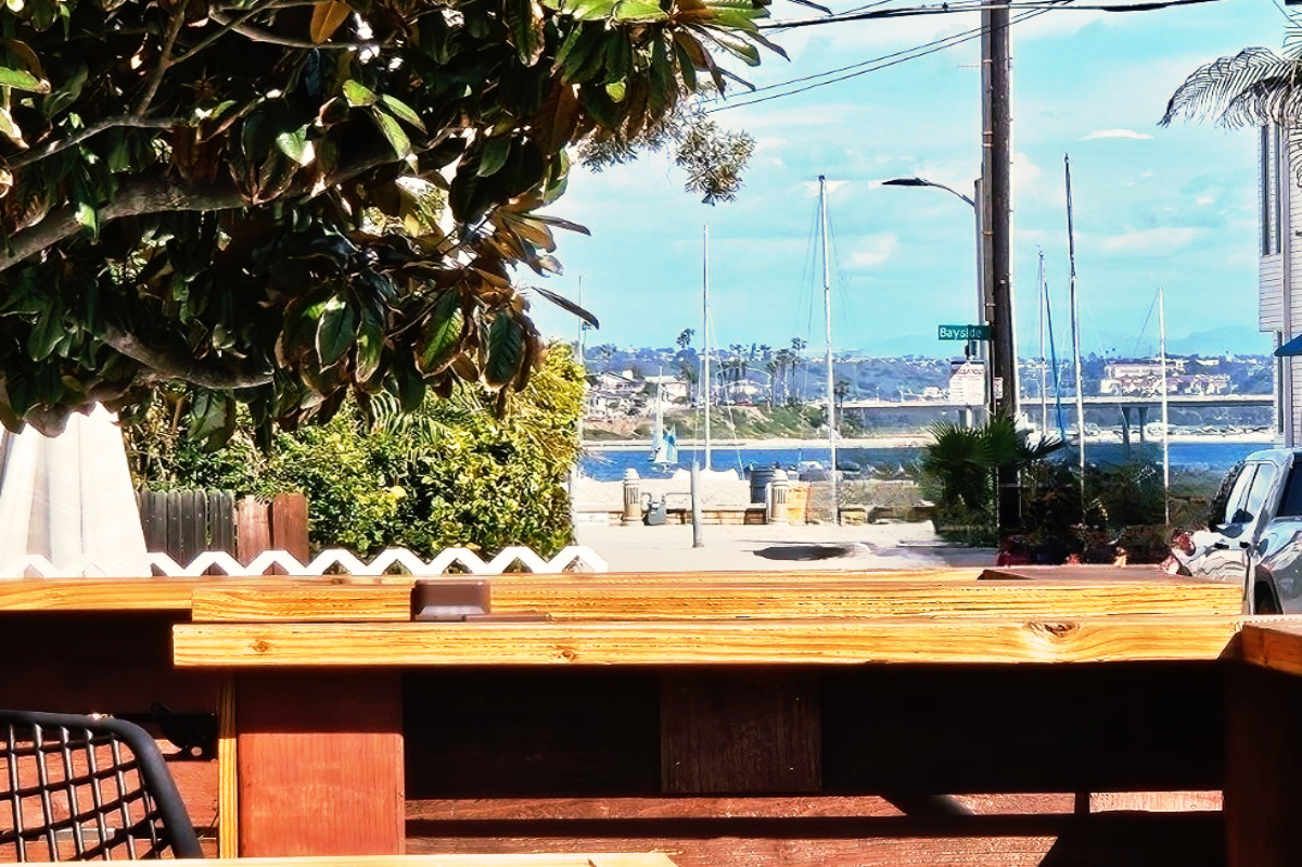 View of bay while sitting at patio table on the front deck.