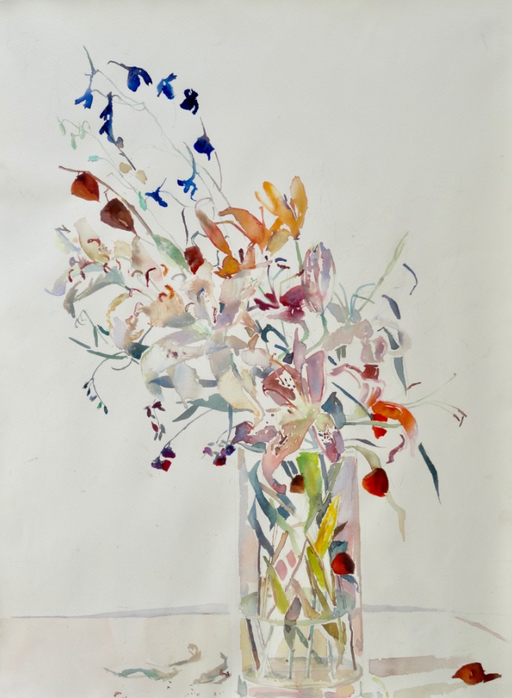 White and Orange Lilies in glass vase