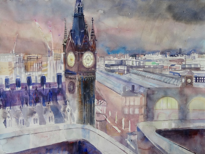 St Pancras Station and view of London rooftops at night.