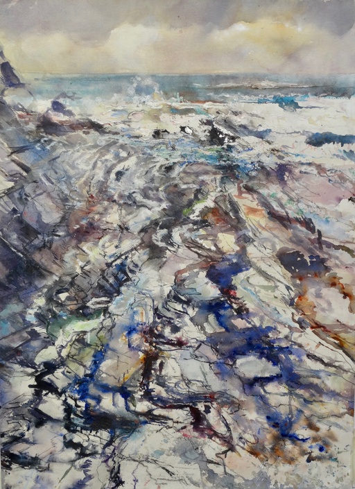 Looking down across the rocks, distant breaking wave, Crackington Haven. Cornwall.