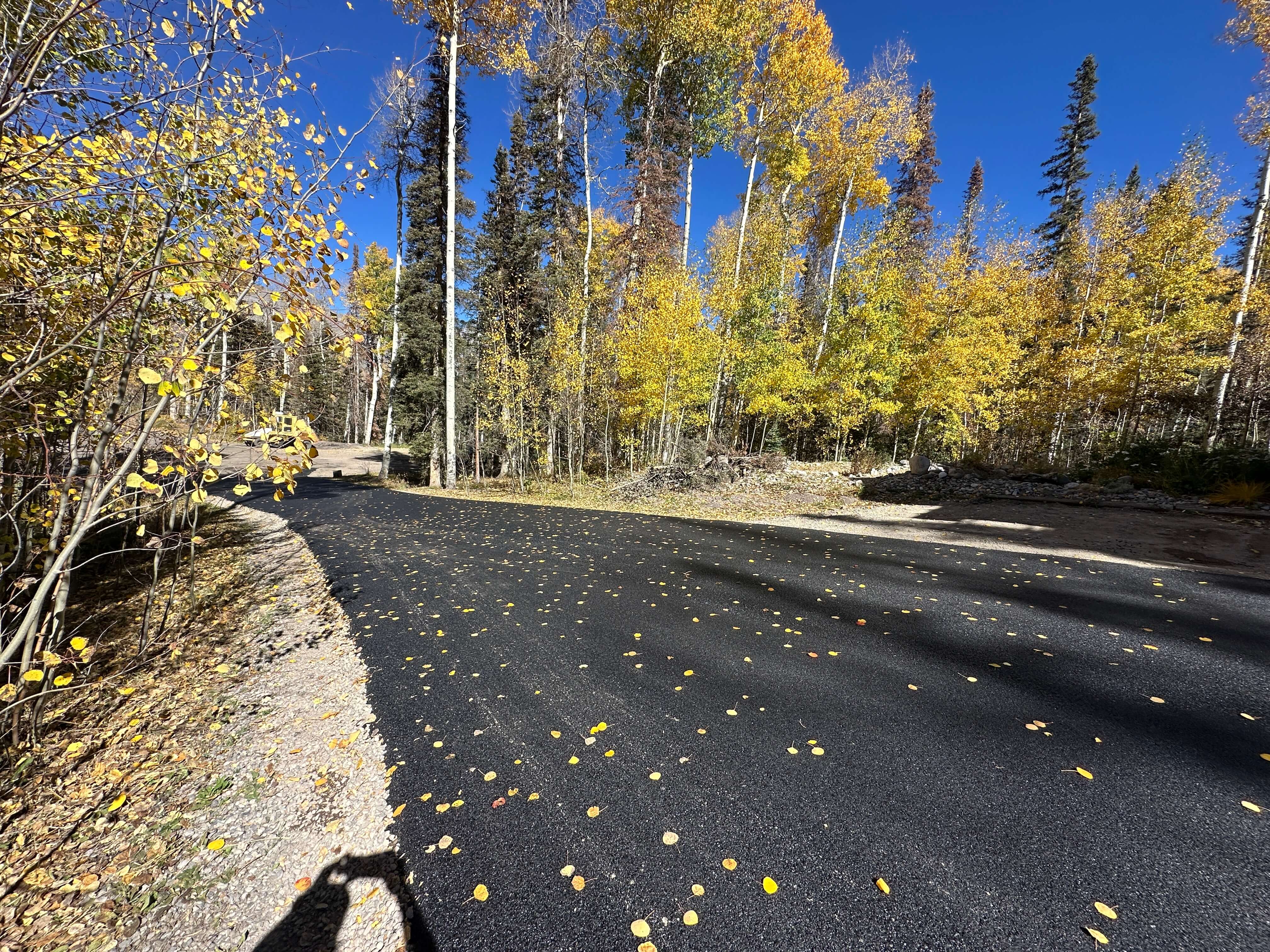 Retail development parking lot in Farmington, NM, showcasing Armor Proseal's ability to create large-scale commercial asphalt surfaces with proper drainage and traffic flow.