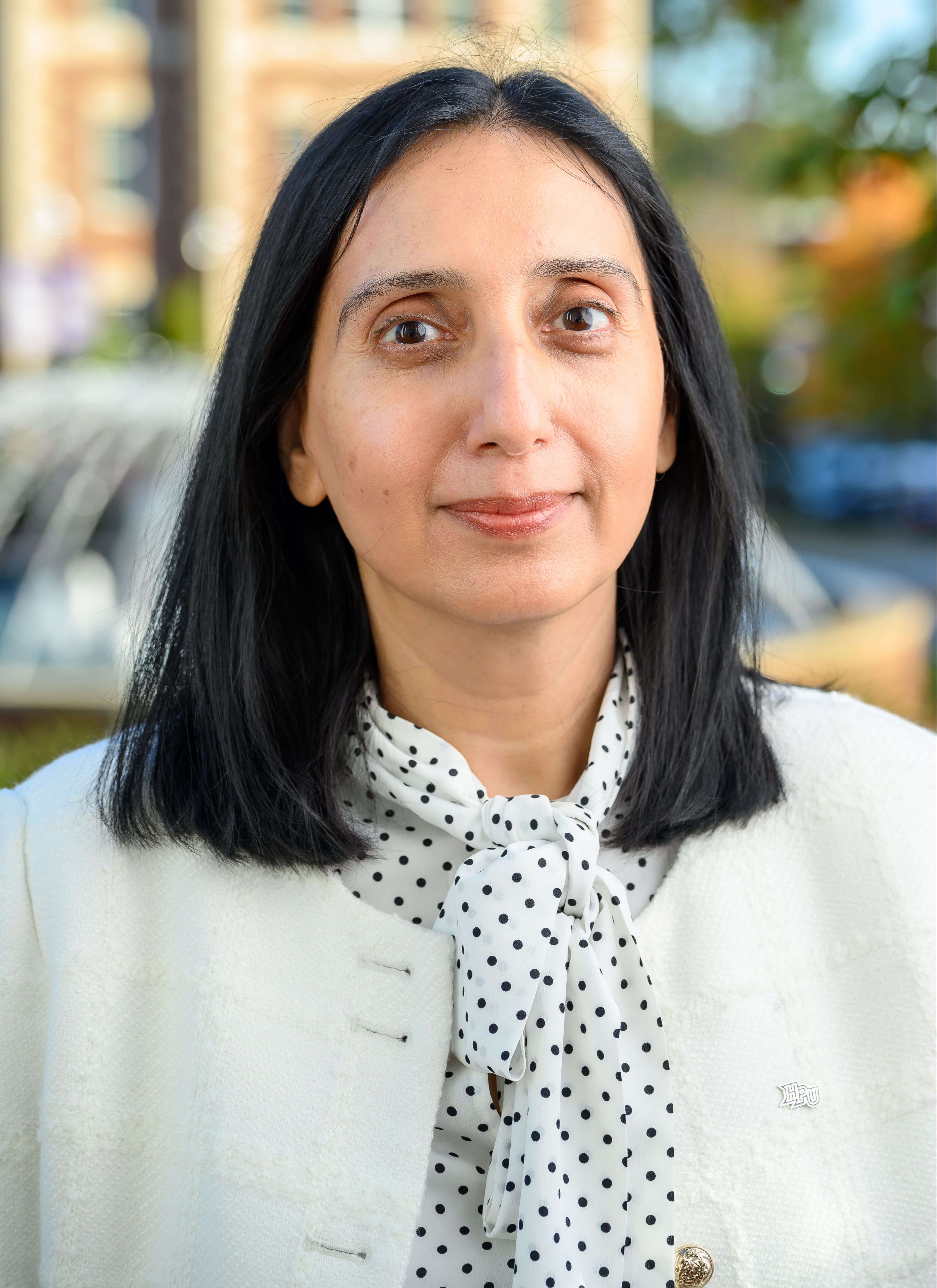 Dr. Amna Hasan, BDS, DABOP, FAAOP, FNAP