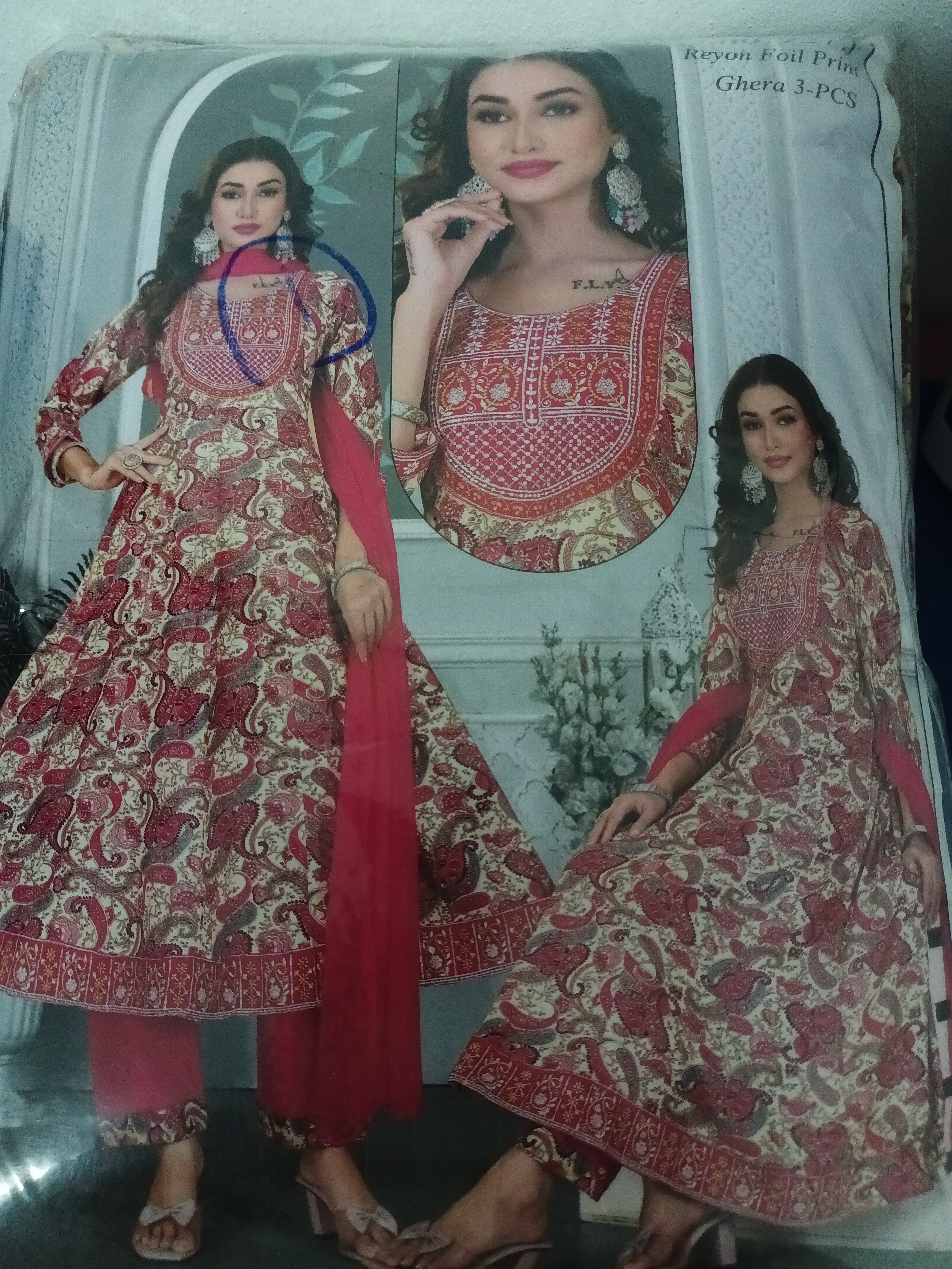Rayon foil print Ghera 3-pieces suit set,designed  to give a rich,festive,and elegant look..The colour combination of deep  red and beige cream create a rich festive appeal..Perfect for celebration